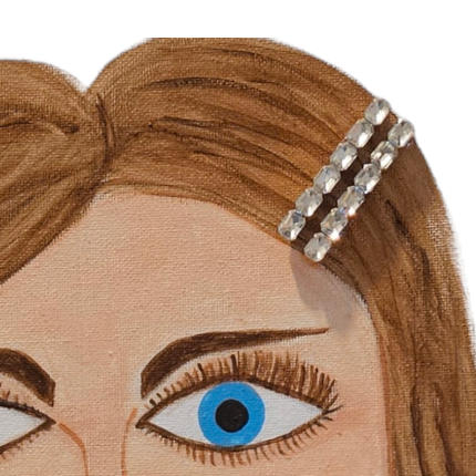 Embroidered design of a face with blue eyes and brown hair with a headband on a white background