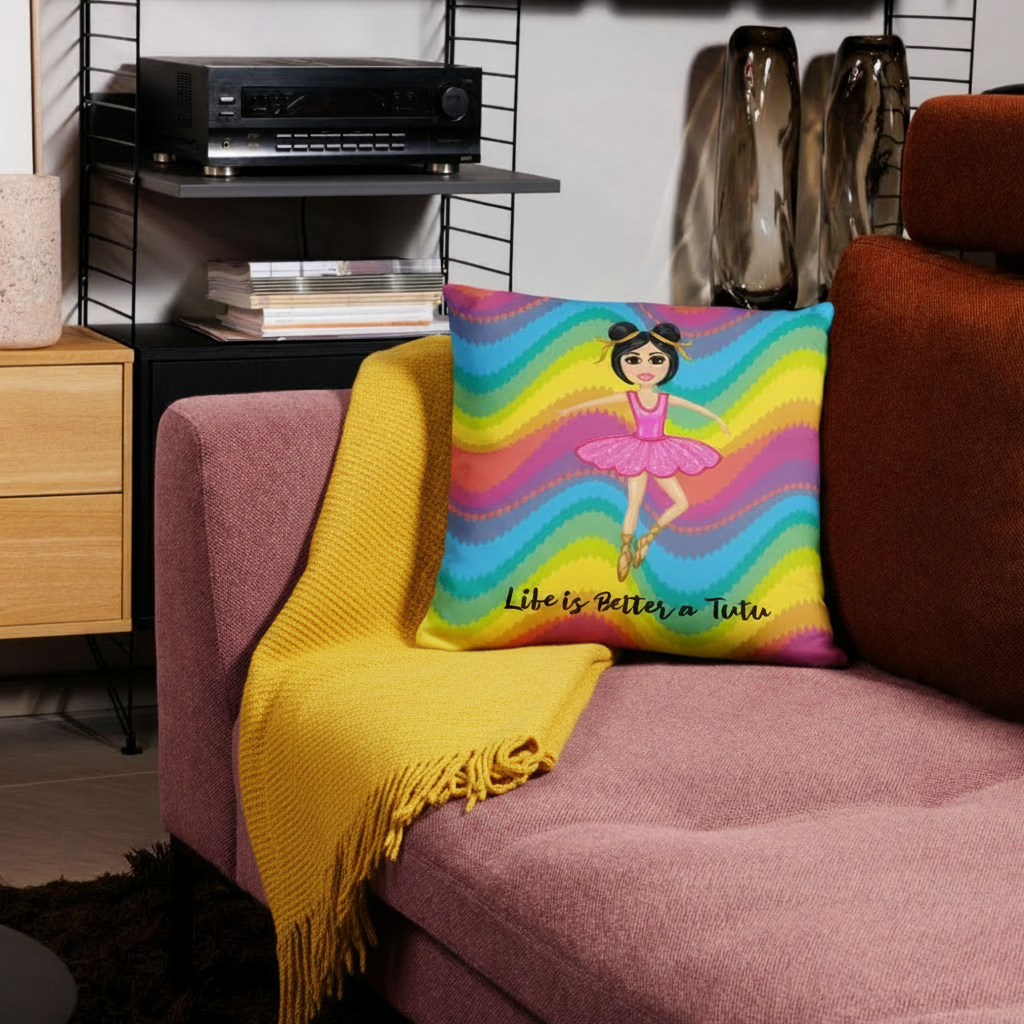 Red sofa with a patterned pillow and blanket in a living room setting.