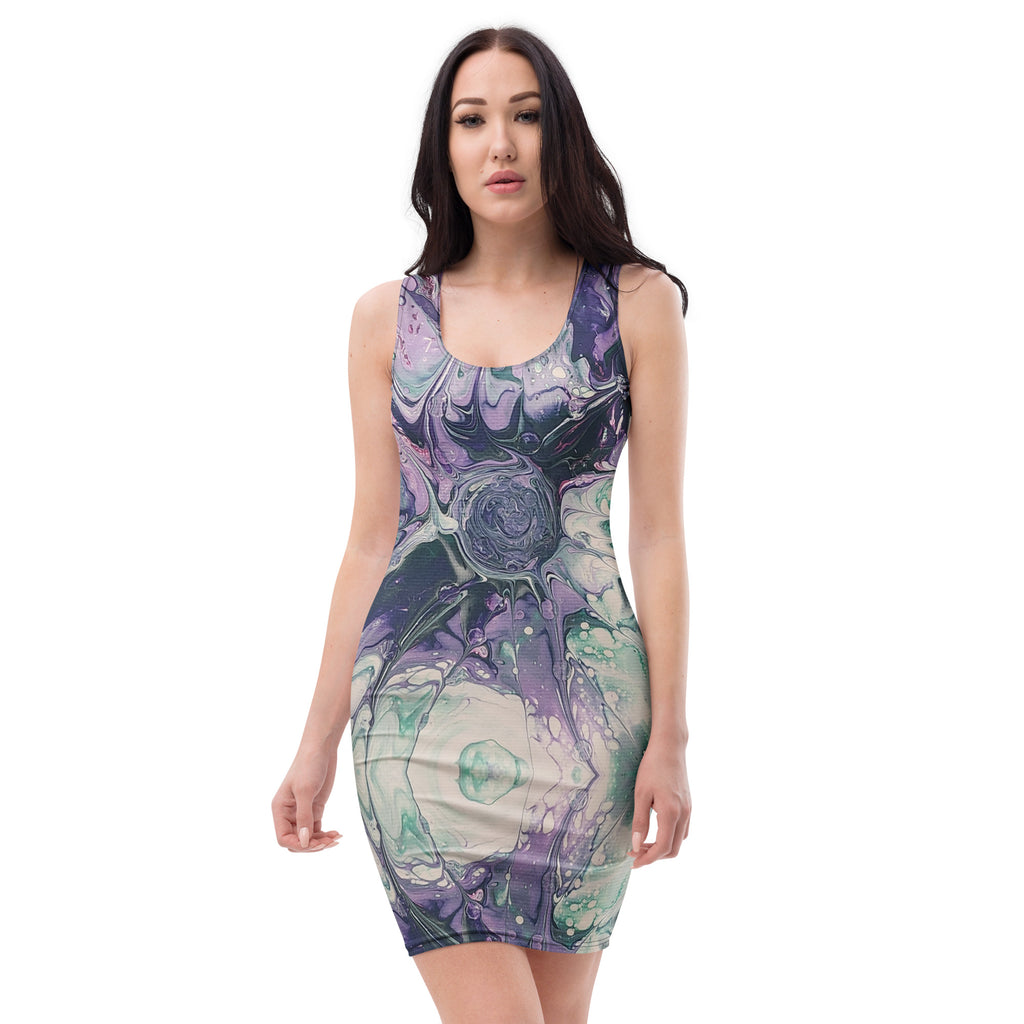 Woman wearing a sleeveless dress with a colorful abstract pattern on a white background