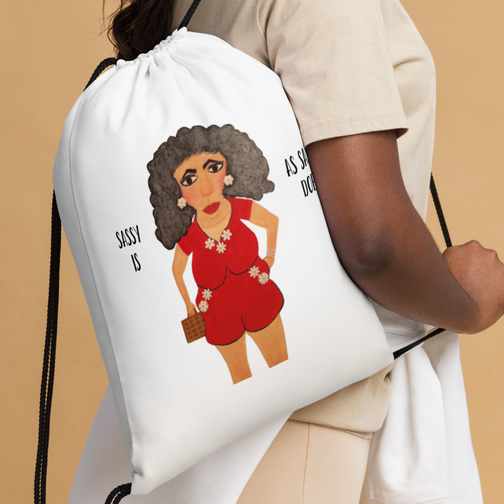 White drawstring bag with an illustration of a woman in a red dress on a beige background