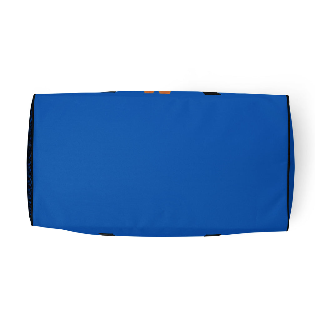 Blue towel with black edges on a white background