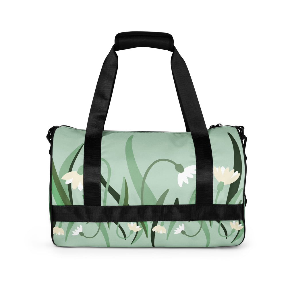Duffle bag with floral design on a white background