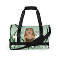 Duffel bag with a graphic design of a person and text on a light green background