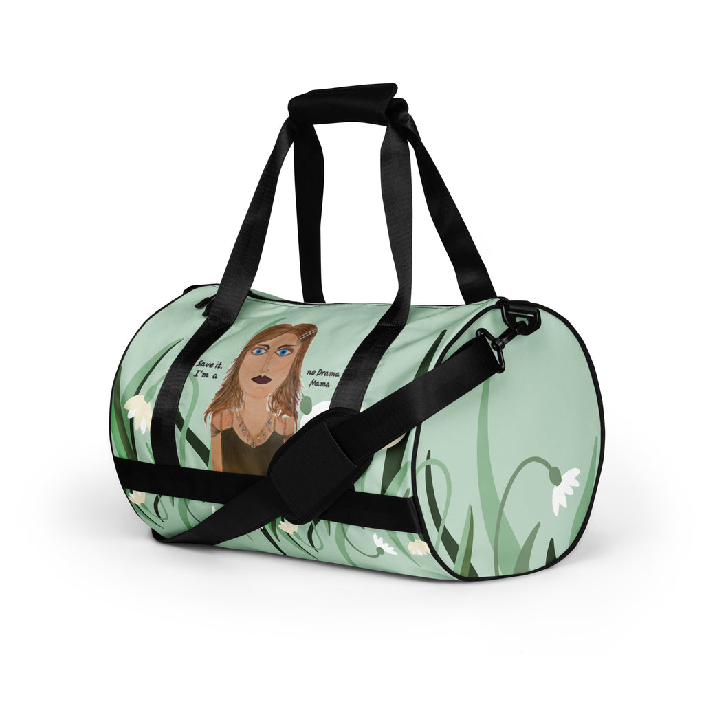 Duffle bag with a design of a woman's face and floral elements on a light green background