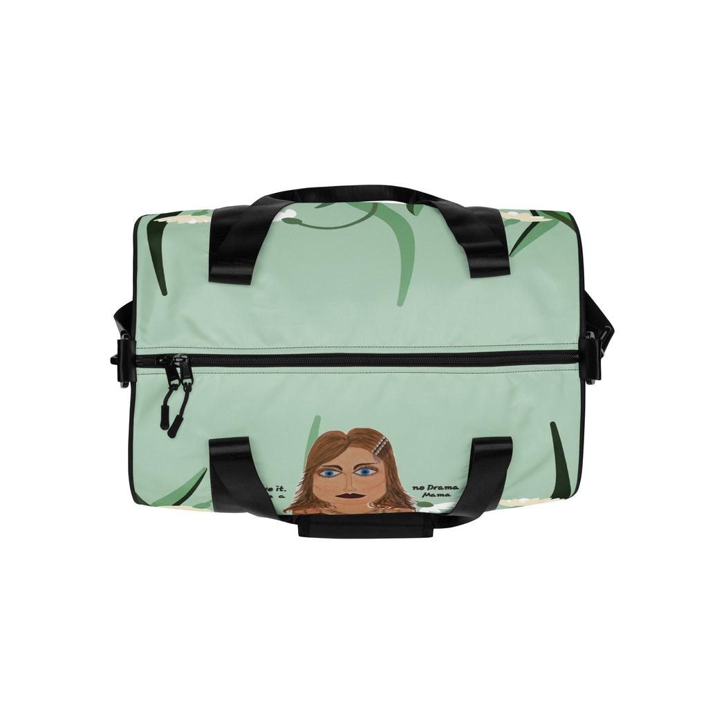 Light green duffel bag with black handles and trim on a white background