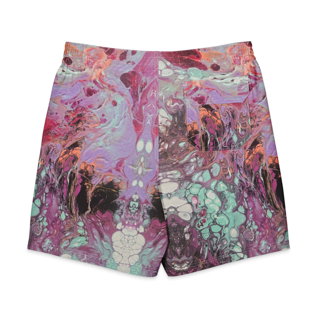 Colorful abstract patterned shorts on a white background