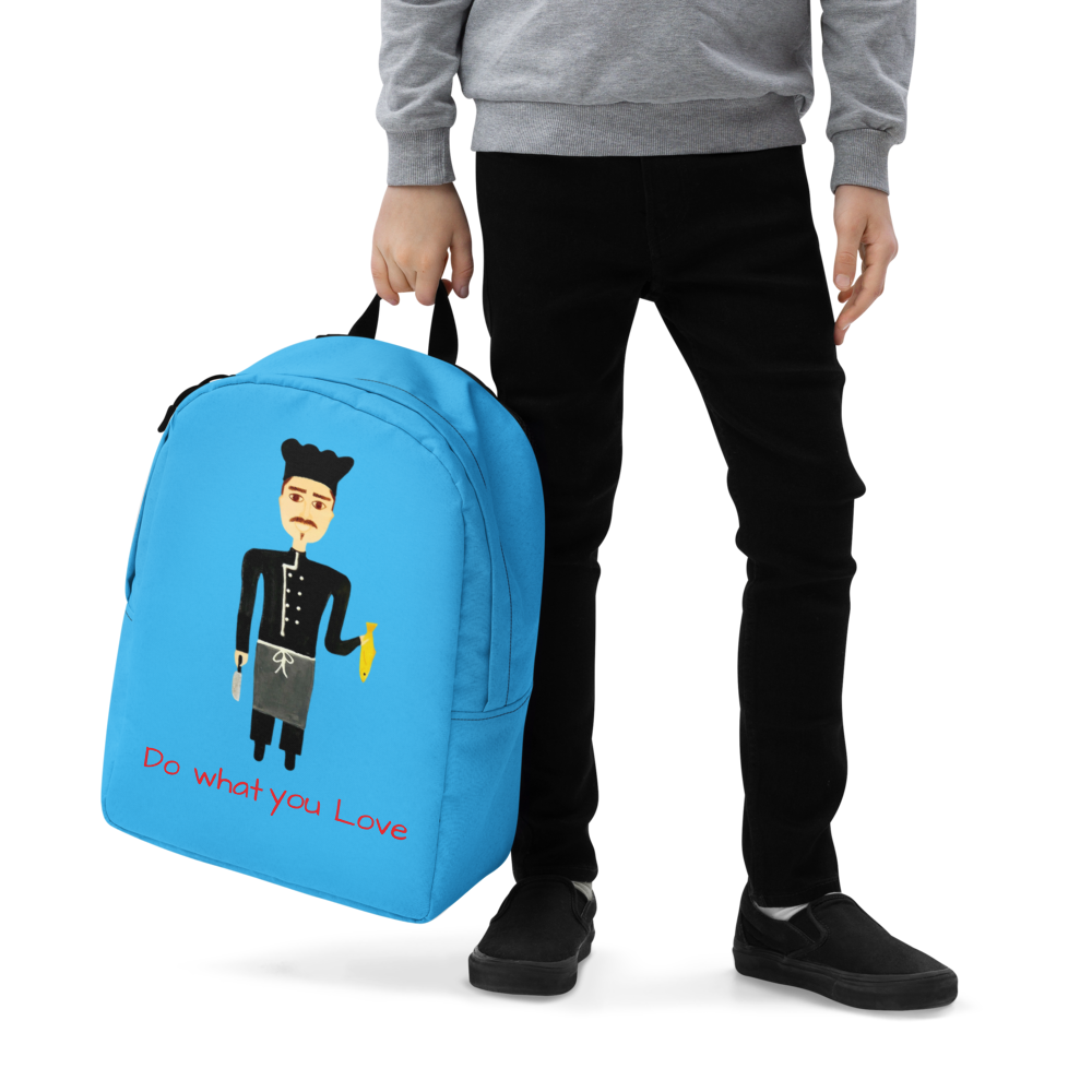 Person holding a blue backpack with a cartoon character and text on a white background