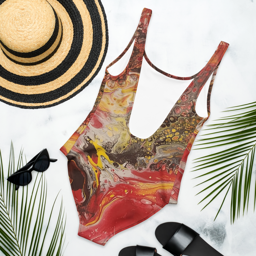 Colorful swimsuit with a straw hat, sunglasses, and sandals on a white background with palm leaves.