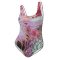 Multicolored swimsuit with abstract design on a white background