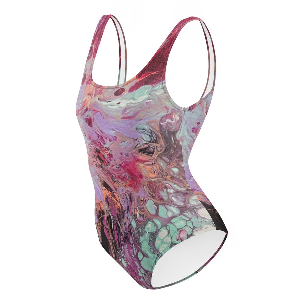 Multicolored swimsuit with abstract design on a white background