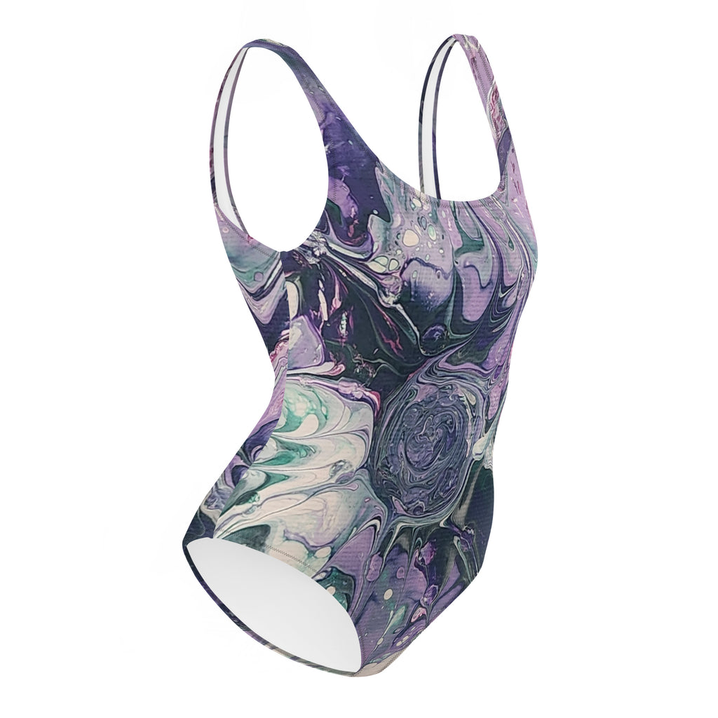 Marbled purple and green swimsuit on a white background