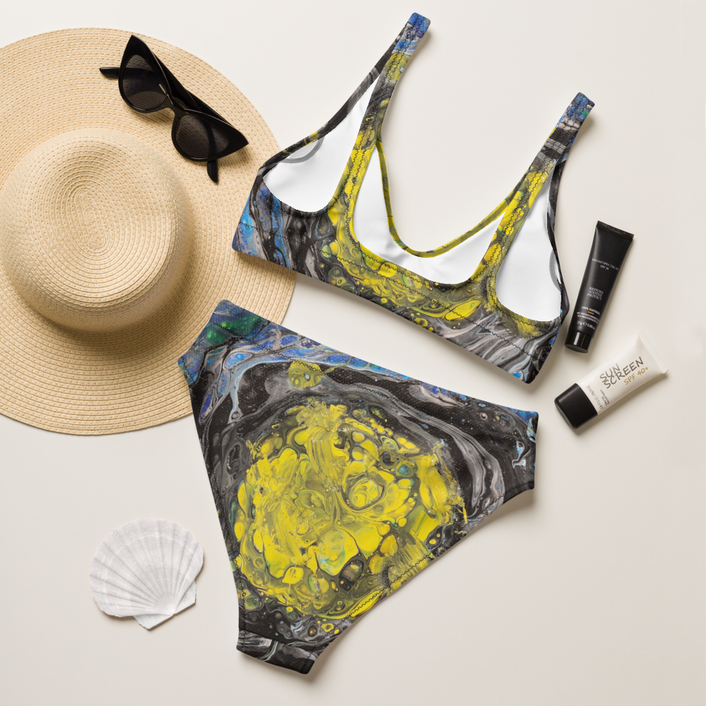 a colorful bikini set on a beach background