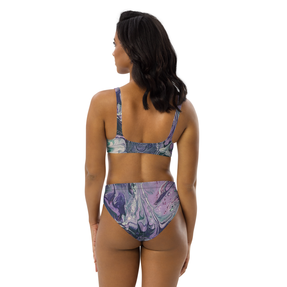 Woman wearing a colorful bikini set on a white background