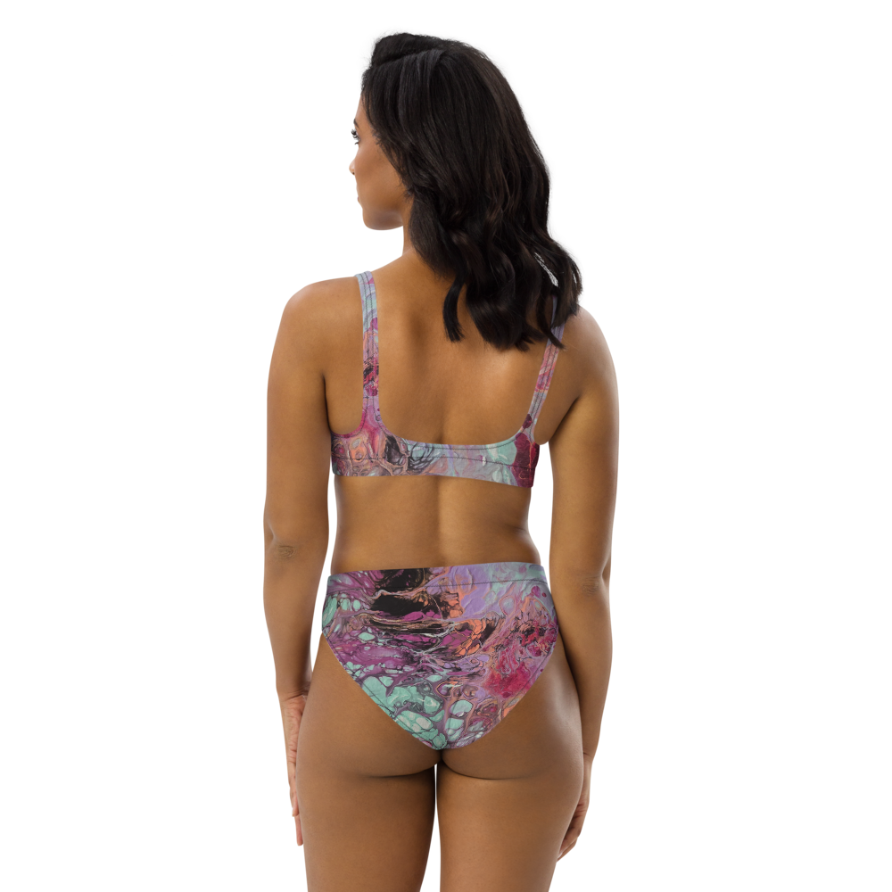 Woman wearing a colorful bikini set on a white background