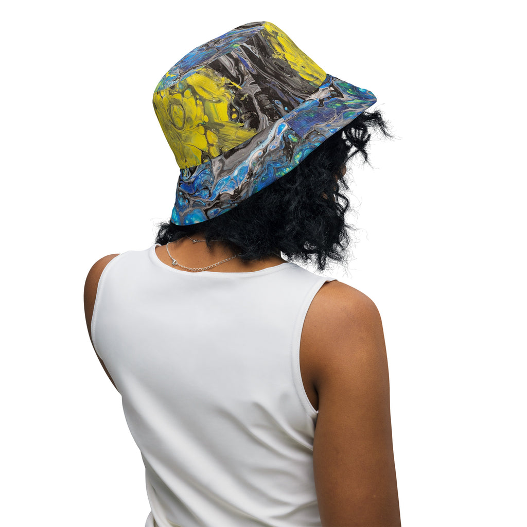 woman wearing a colorful bucket hat on a white background