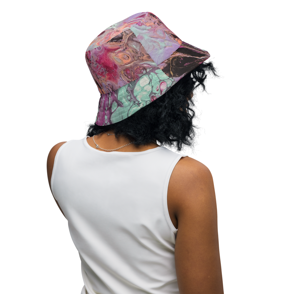 Person wearing a colorful bucket hat on a white background