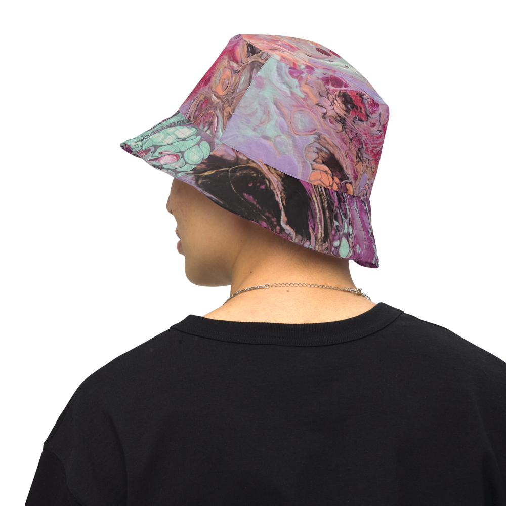 Person wearing a colorful bucket hat on a white background