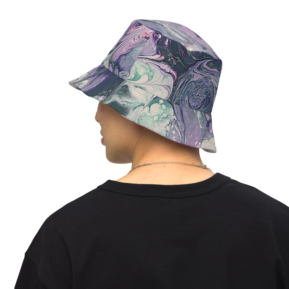 Person wearing a colorful marble-patterned bucket hat on a white background