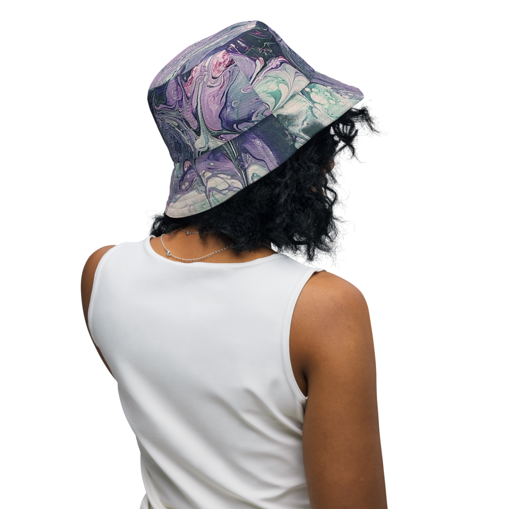 Person wearing a colorful bucket hat on a white background