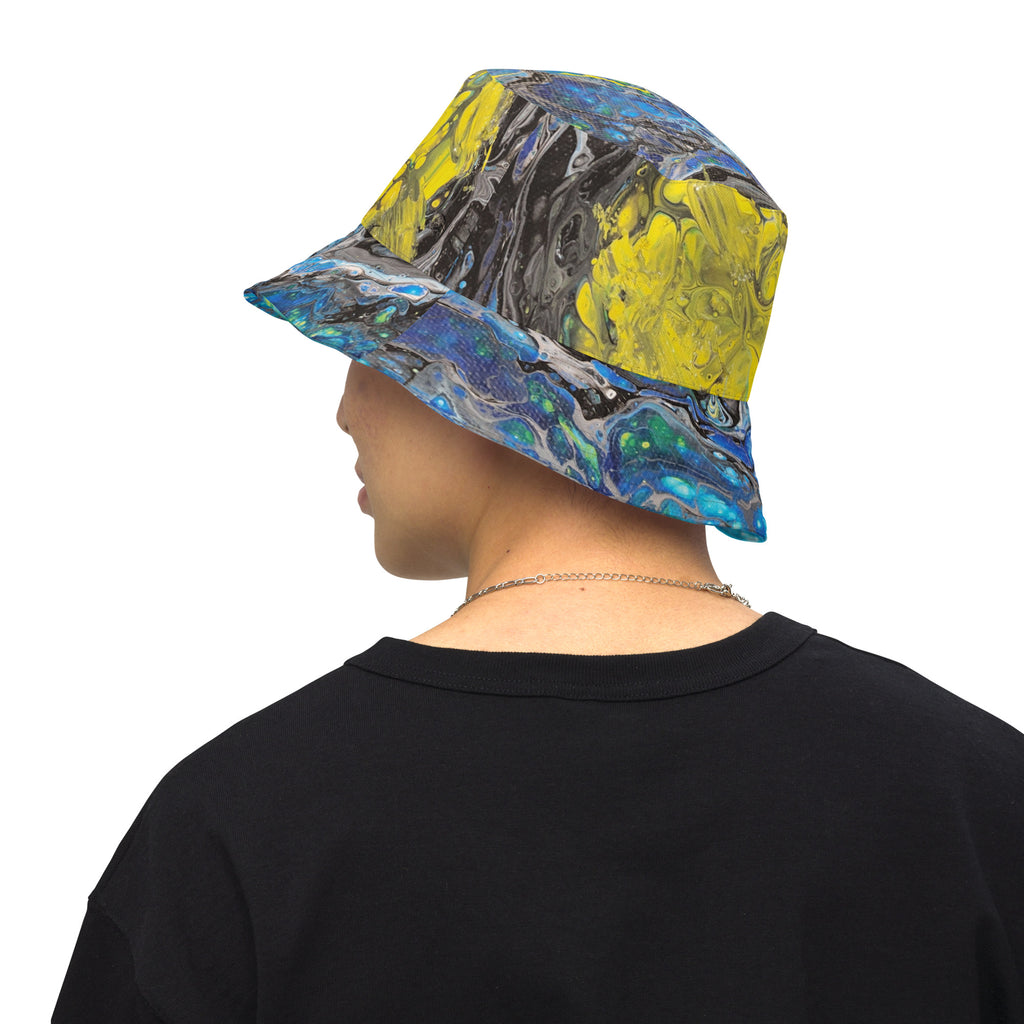 man wearing a colorful bucket hat on a white background