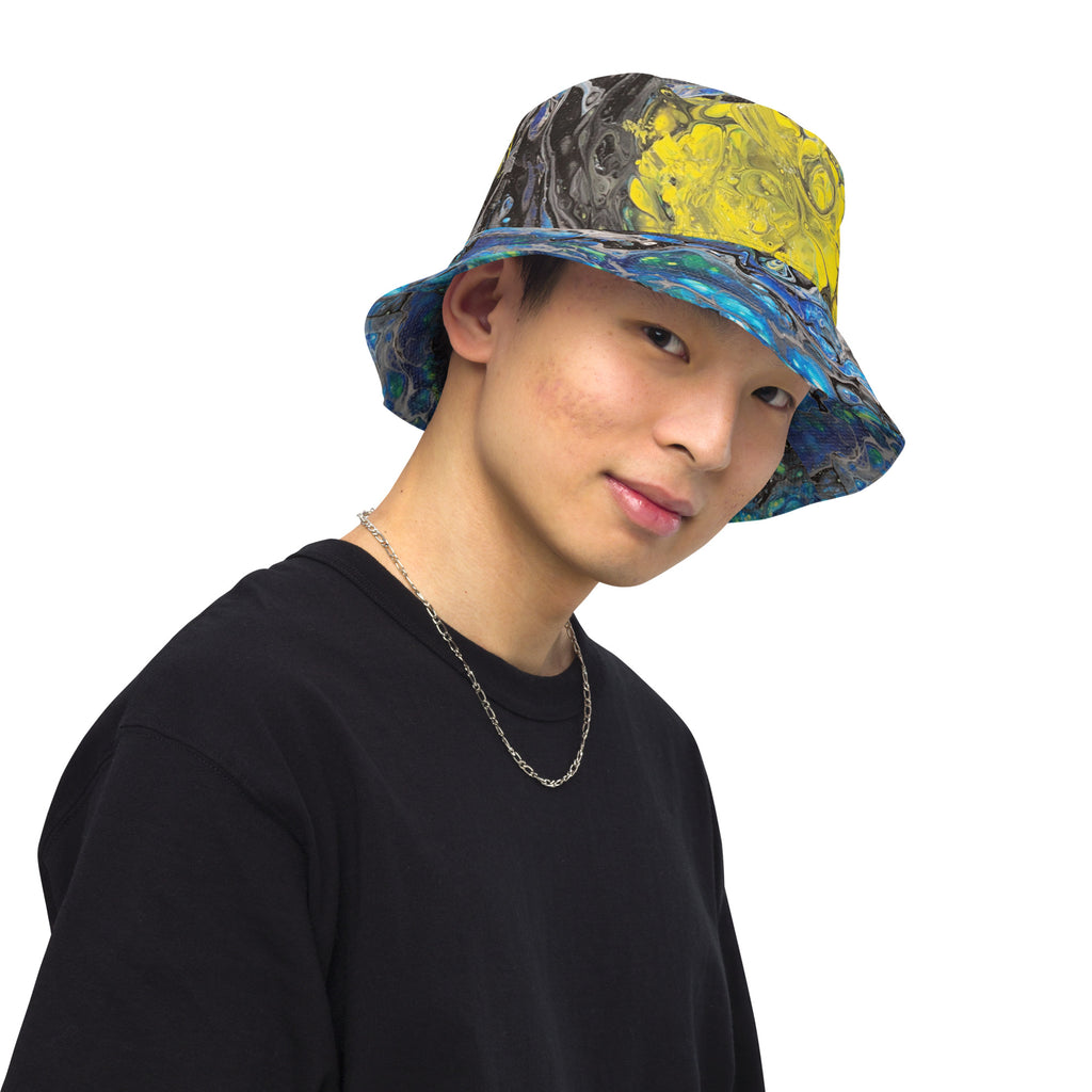 man wearing a colorful bucket hat on a white background