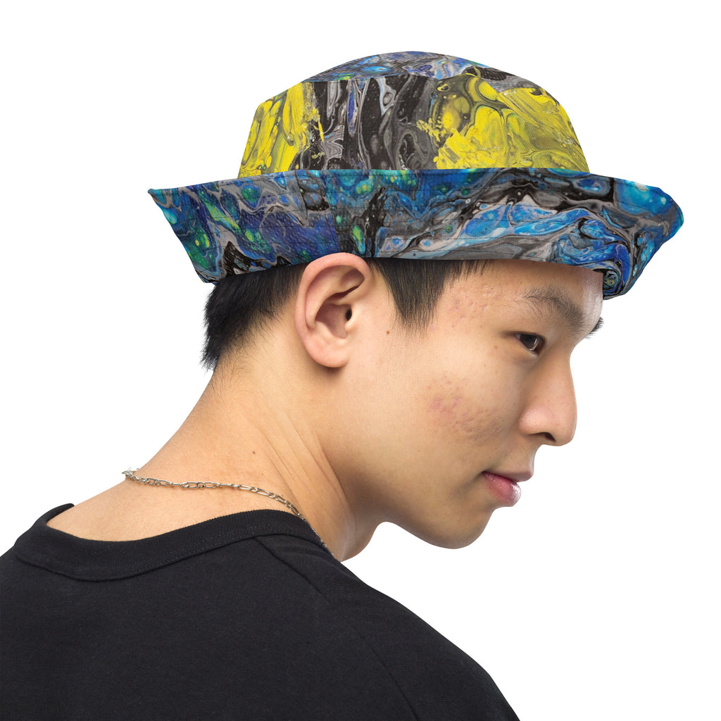 man wearing a colorful bucket hat on a white background