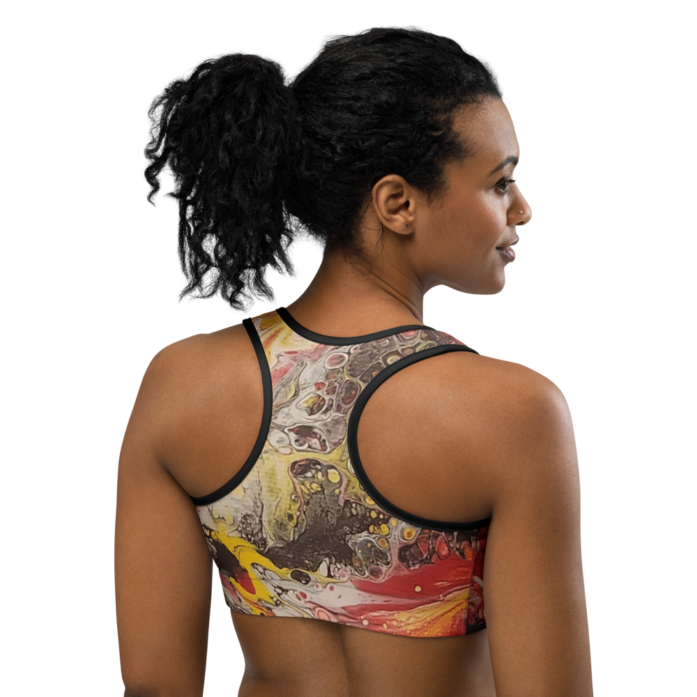 Woman wearing a colorful sports bra with a white background