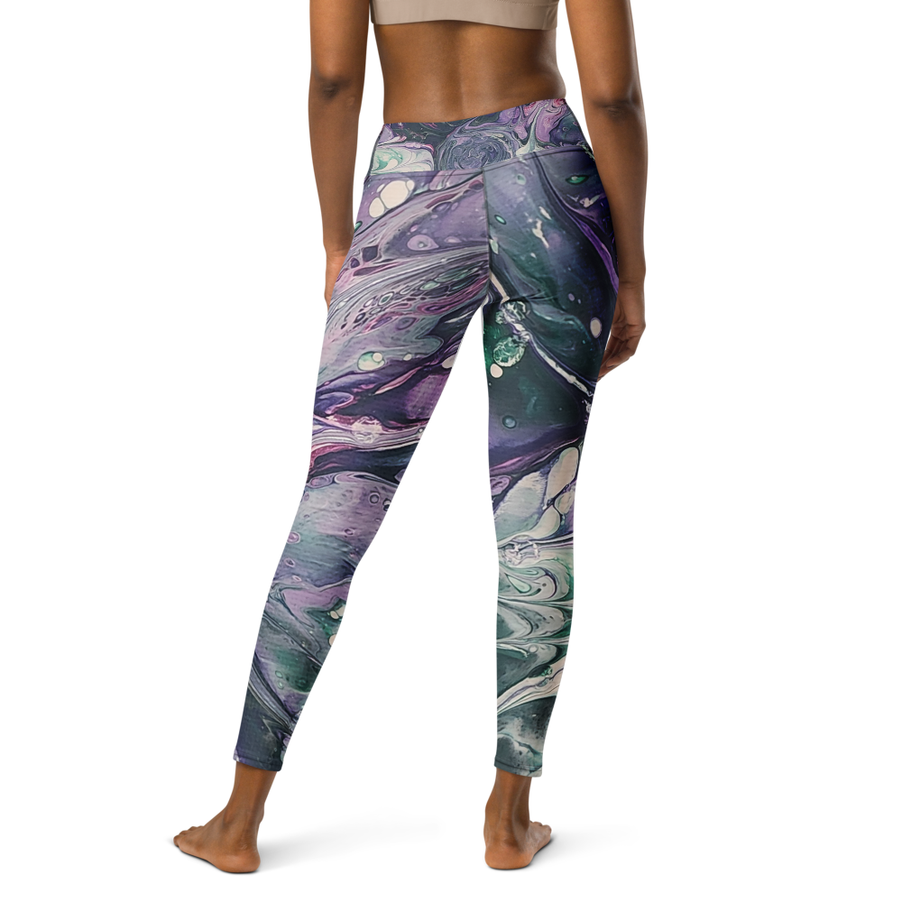 Multicolored marbled leggings worn by a person on a white background