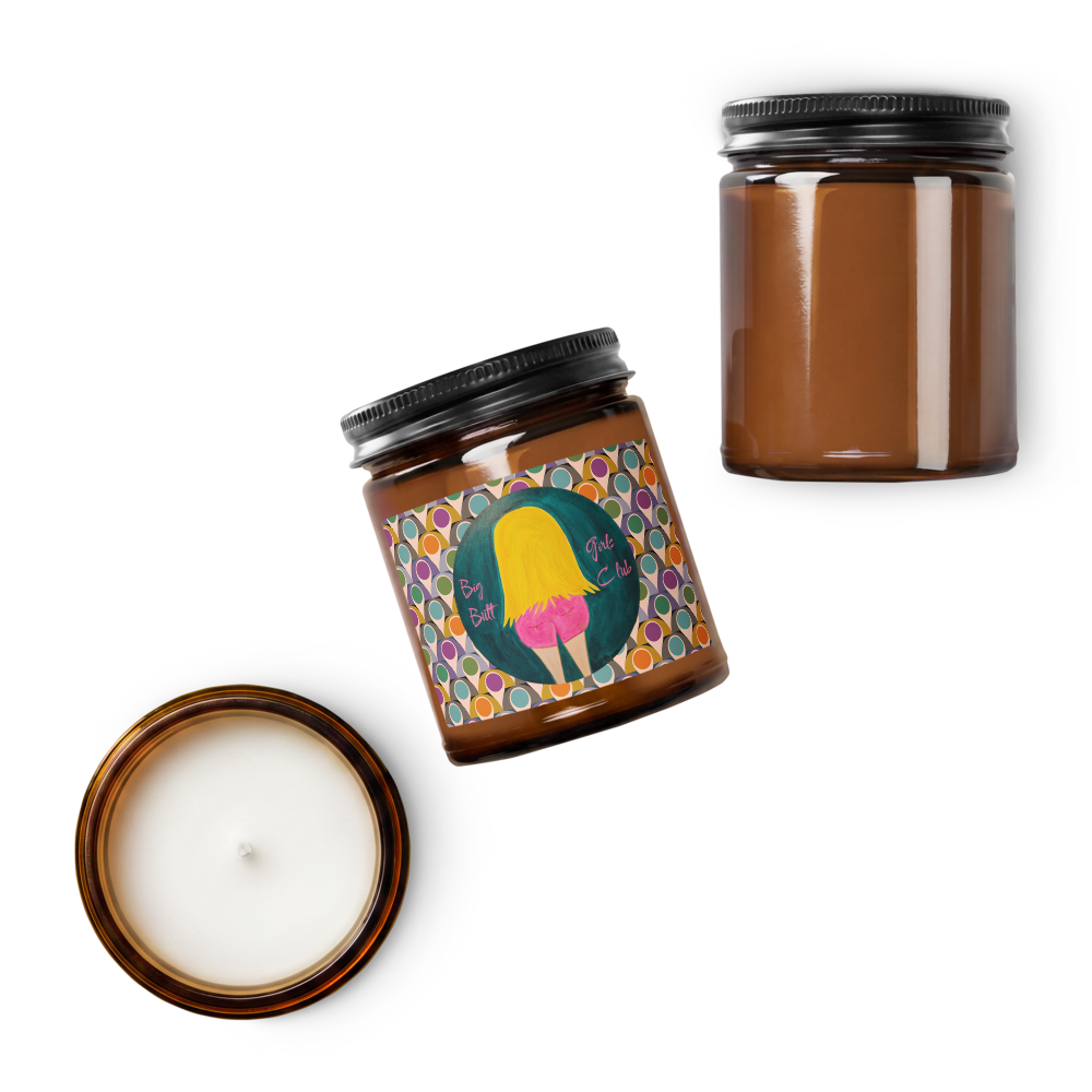 Two brown candles with black lids on a white background