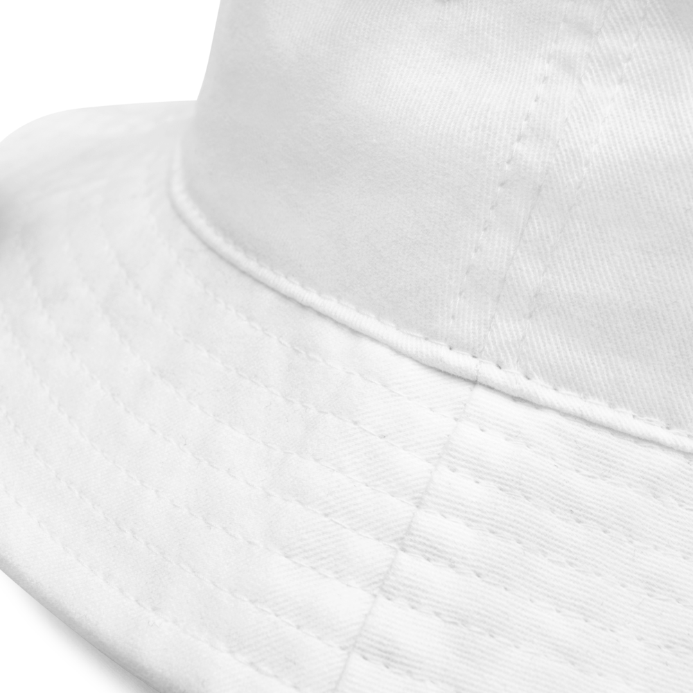 Close-up of a white hat with a focus on texture and color.