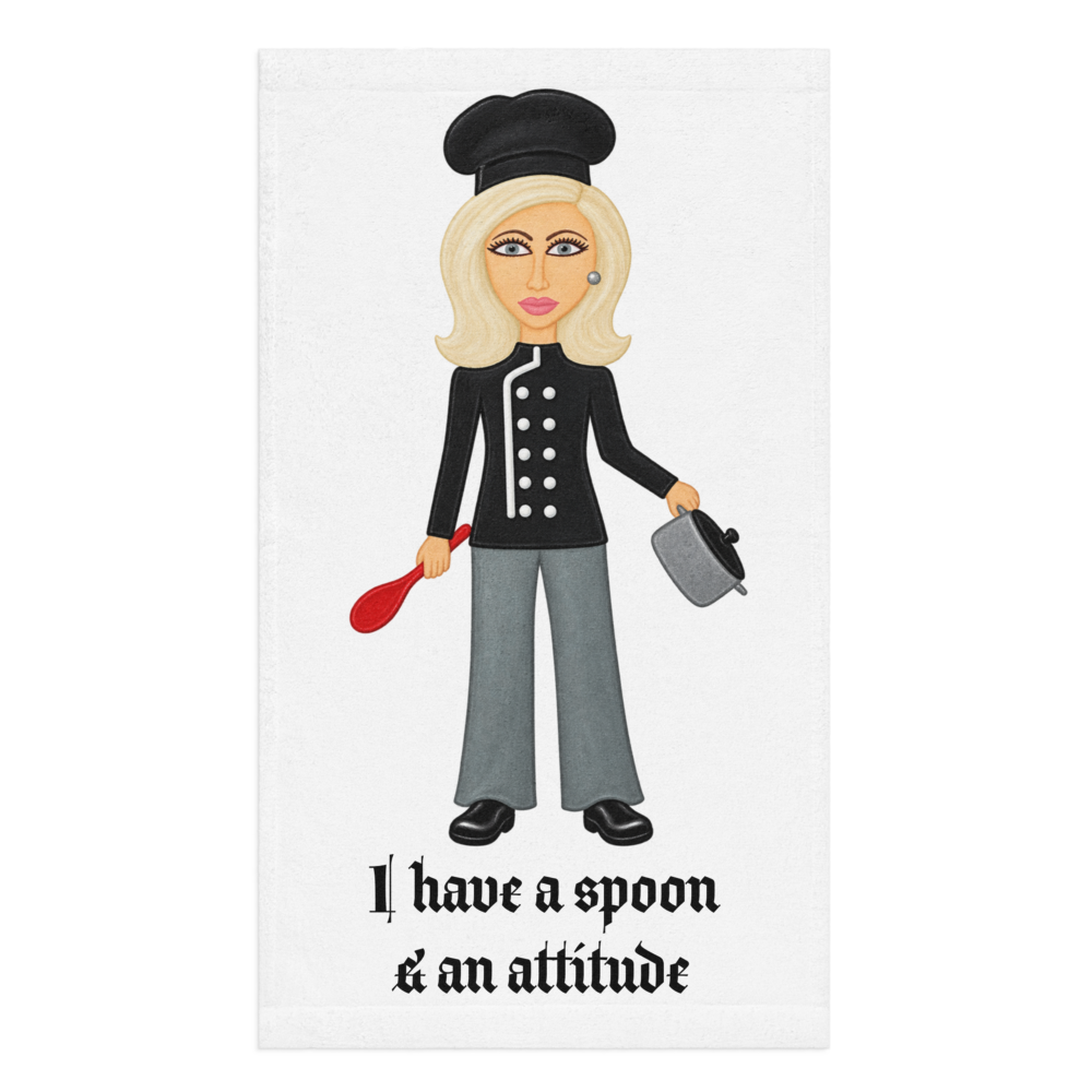 picture of kitchen hand towel with a whimsical  lady chef cartoon on a white background