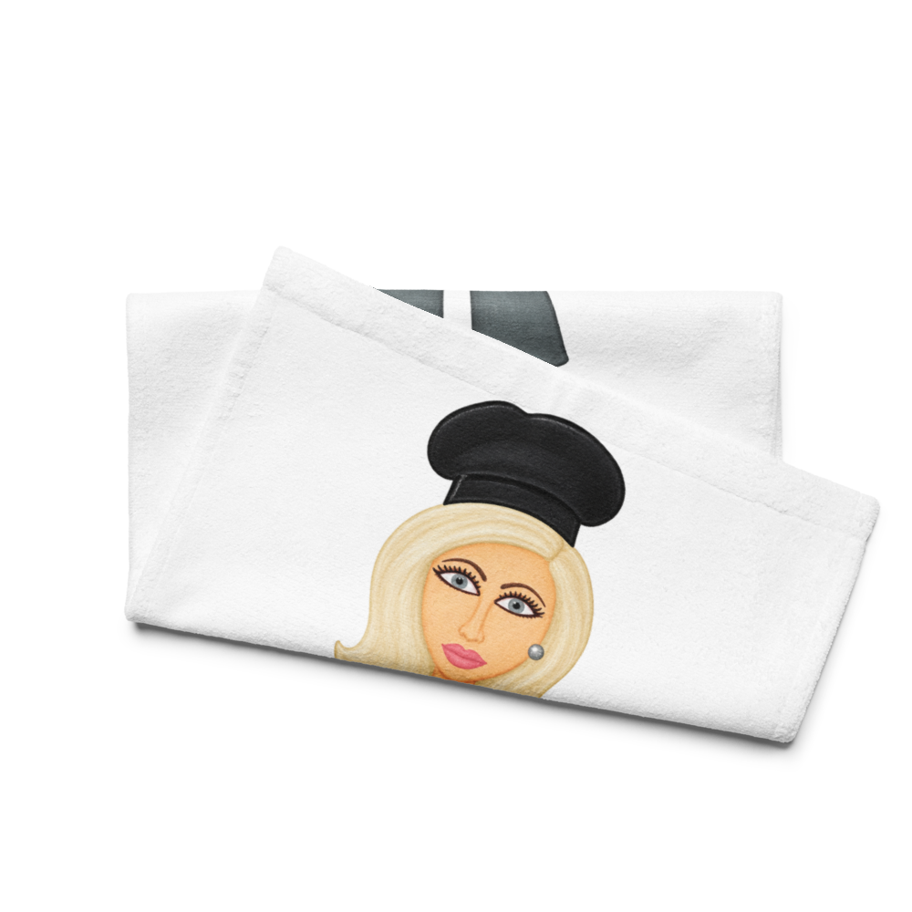 picture of kitchen hand towel with a whimsical  lady chef cartoon on a white background