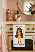 whimsical character kitchen hand towel hanging on a stove in a girlie kitchen