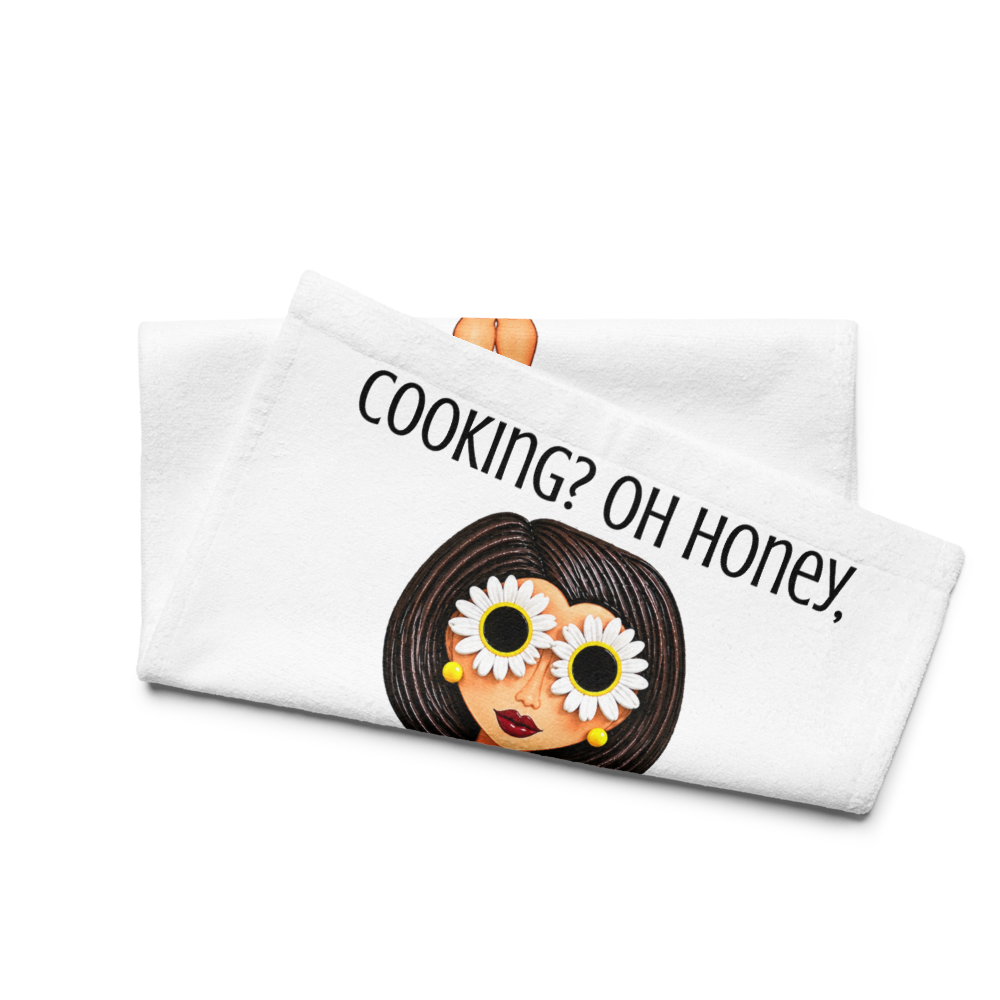 side view of a kitchen hand towel with a whimsical character dressed in daisys on a white background