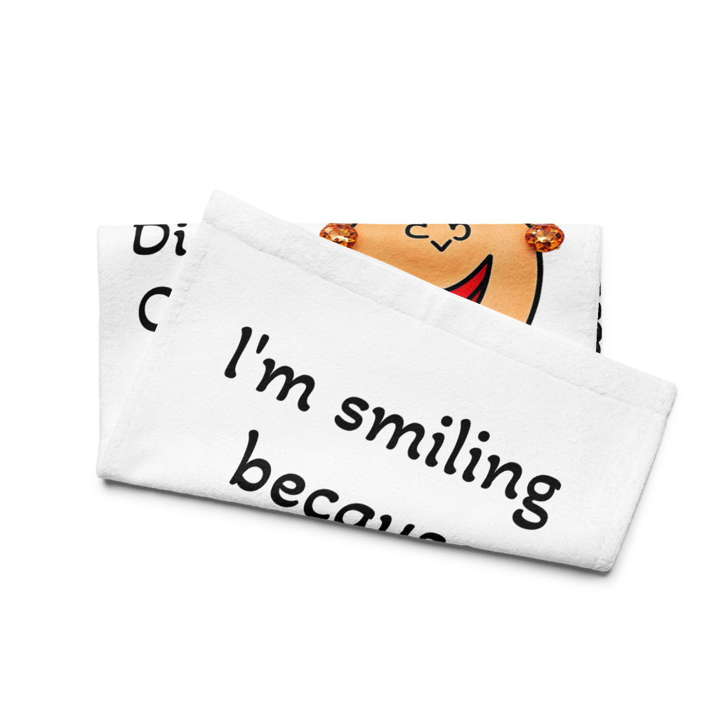 side view of a whimsical character kitchen hand towel on a white background