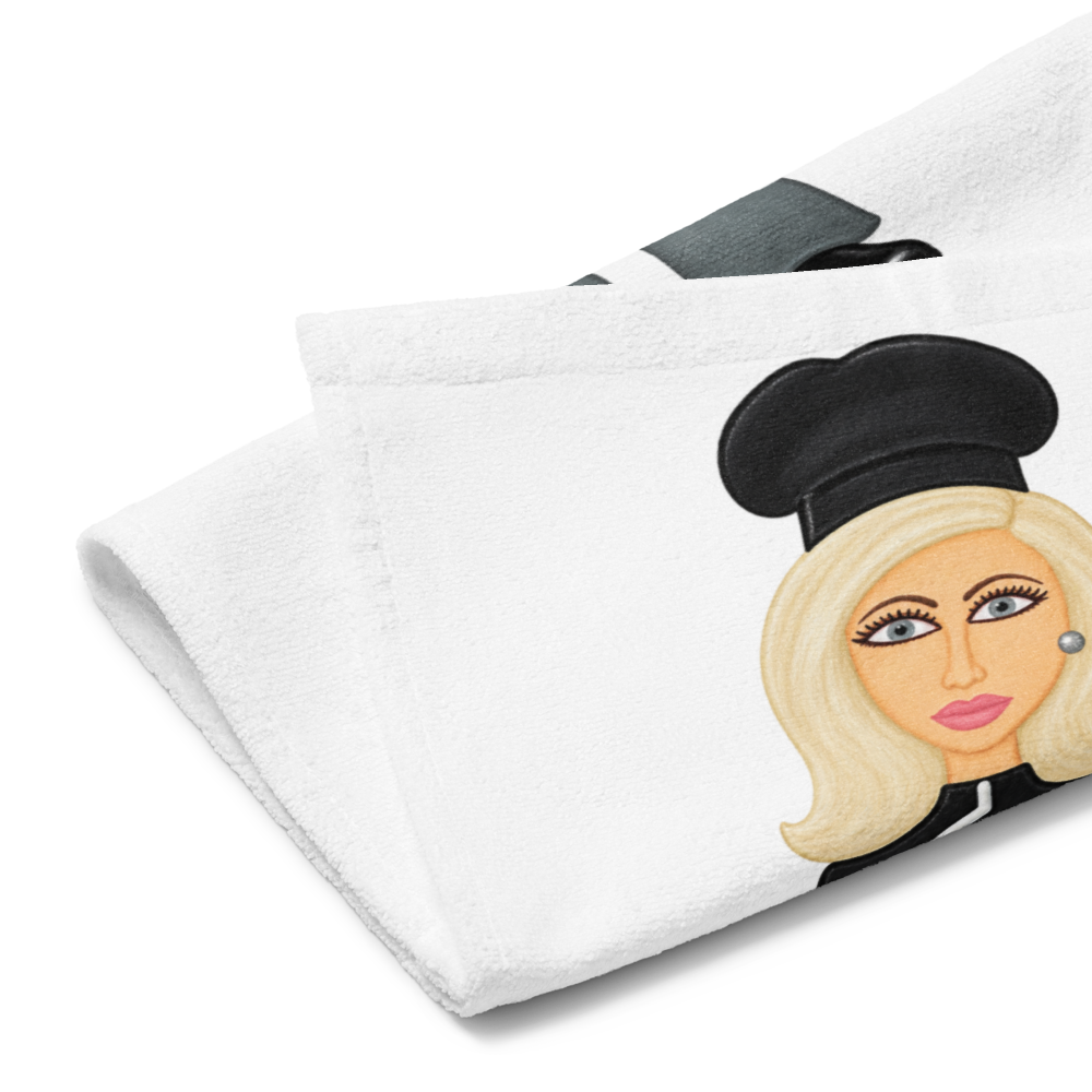picture of kitchen hand towel with a whimsical  lady chef cartoon on a white background