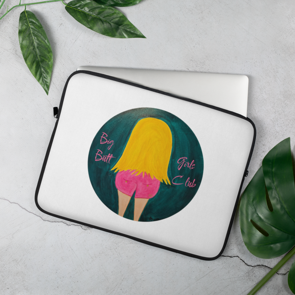 Laptop sleeve with a graphic design of a silhouette and text on a white surface with green leaves.