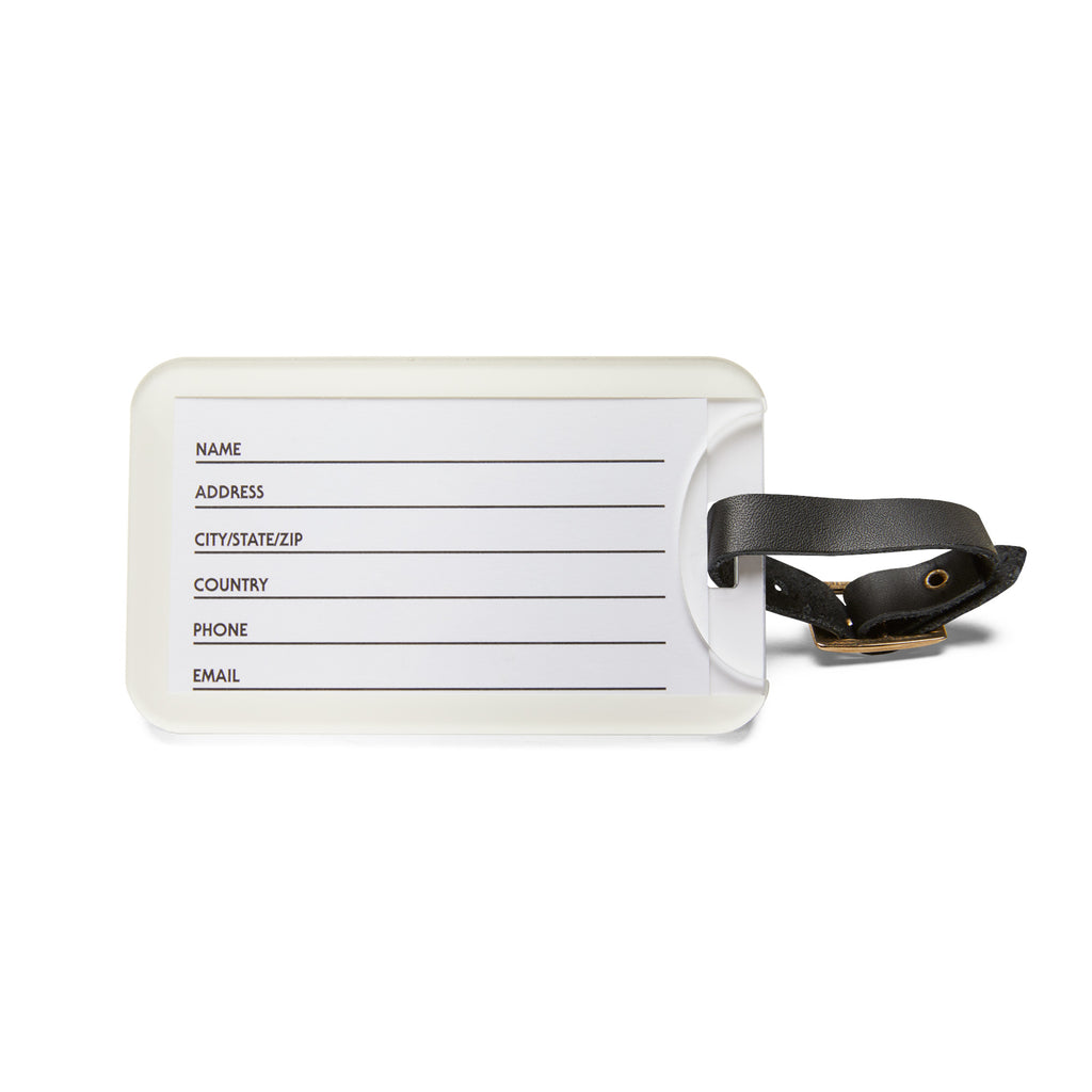 backside of a luggage tag on a white background
