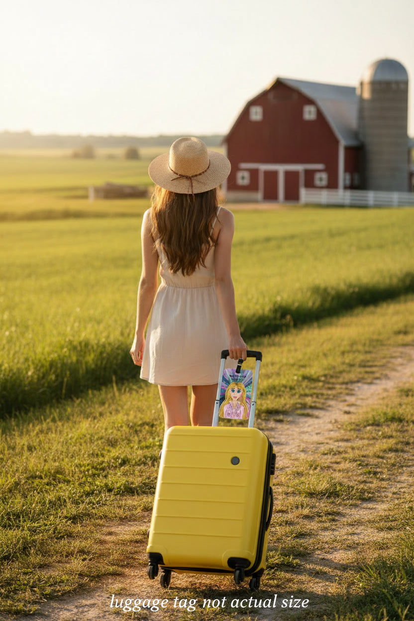 A rectangular luggage tag with rounded corners, featuring a colorful illustrated portrait of a blonde woman with blue eyes and pink clothing, plus the text 'Southern Sass on the Go.' The tag has a black strap with a gold-tone buckle and is shown on a plain white background.