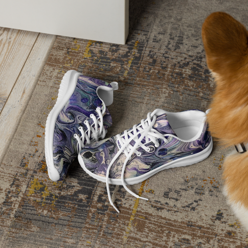 Pair of purple marbled sneakers on a textured rug with a dog's paw in the foreground.