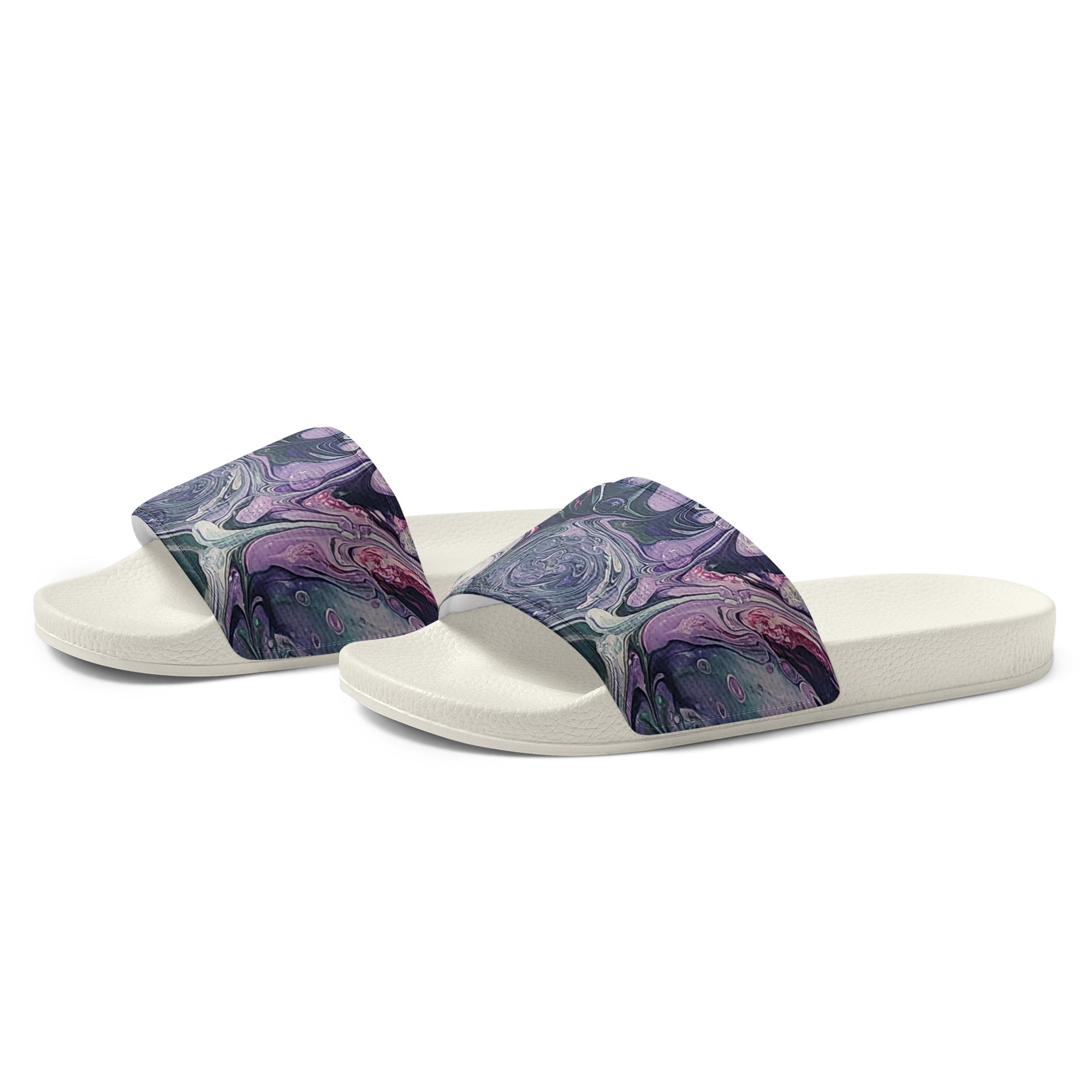 Pair of slides with purple and white marbled design on a white background