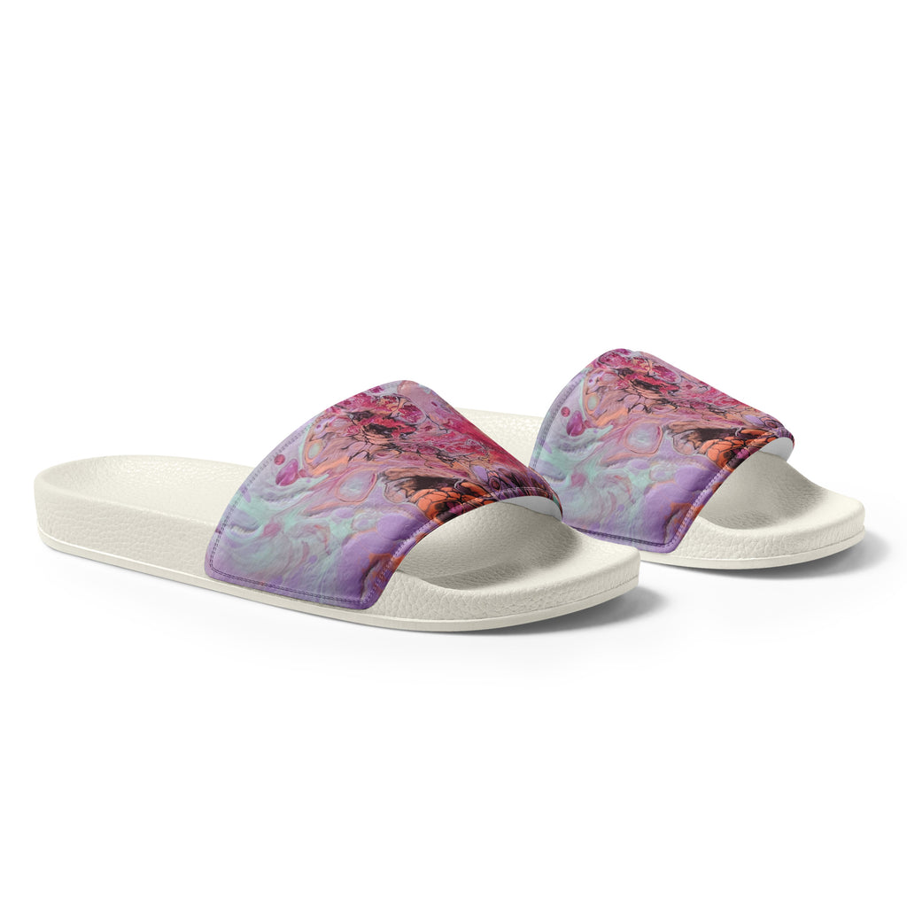 Pair of colorful slides with a white sole on a white background