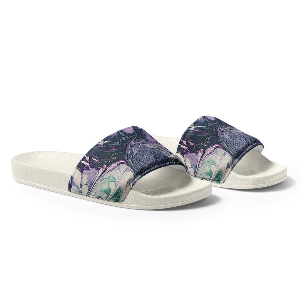 Pair of slides with purple and green marbled design on a white background