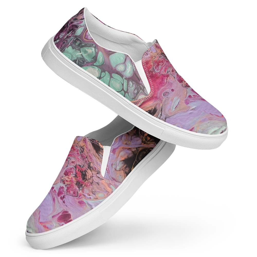 Colorful marbled slip-on shoes on a white background