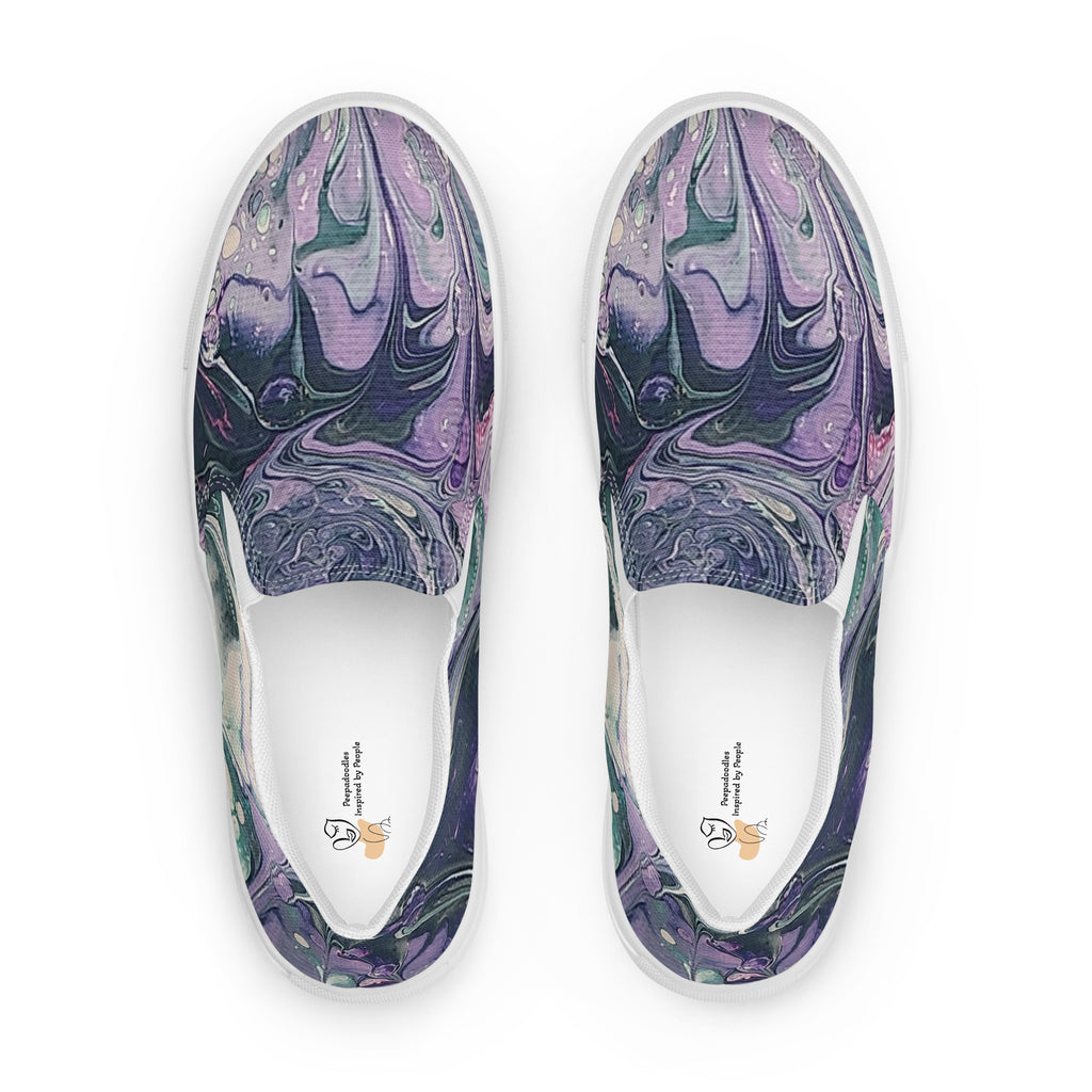 Pair of slip-on shoes with marbled purple and green design on a white background
