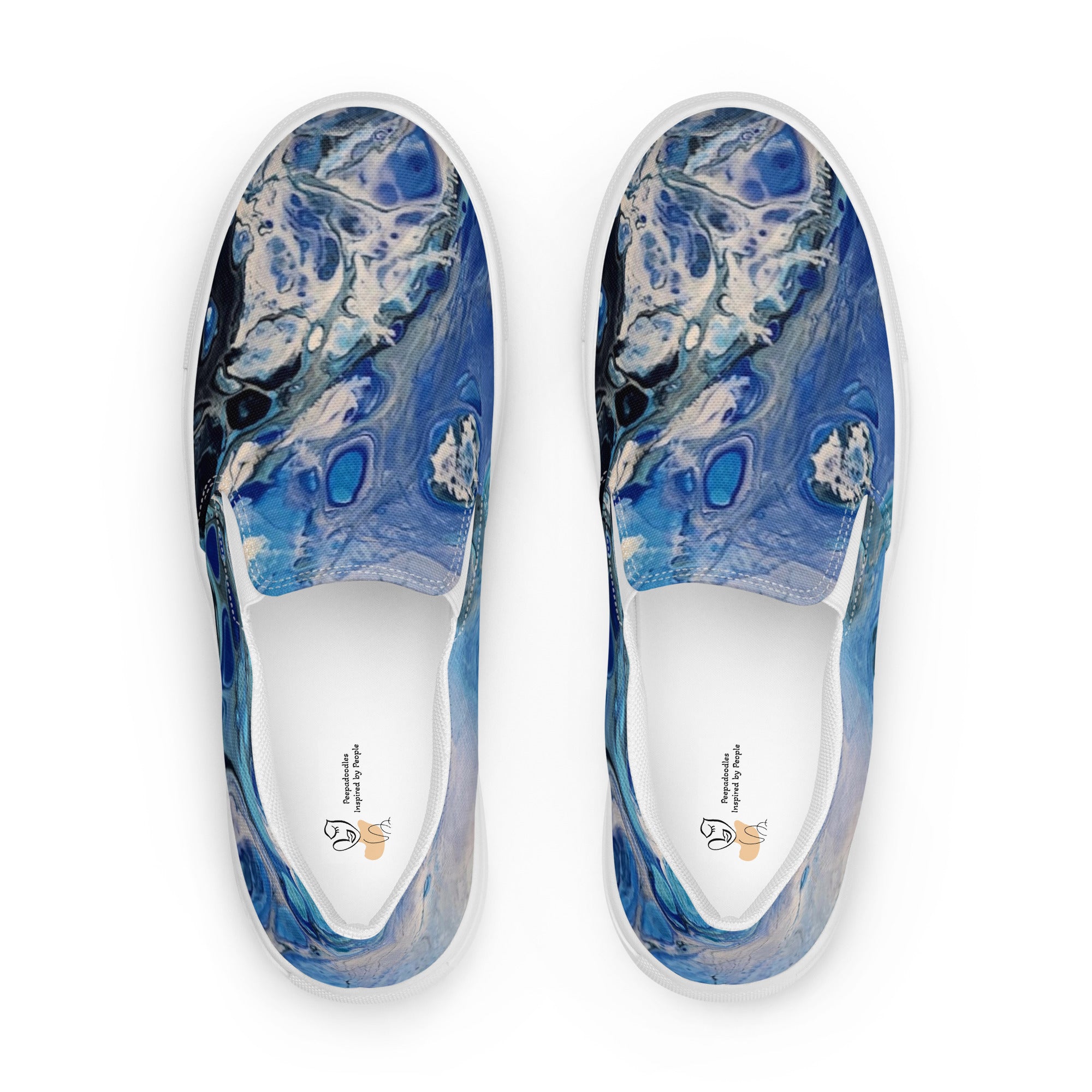 Blue marbled slip-on shoes on a white background