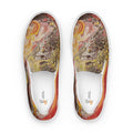 Colorful slip-on shoes with abstract design on a white background