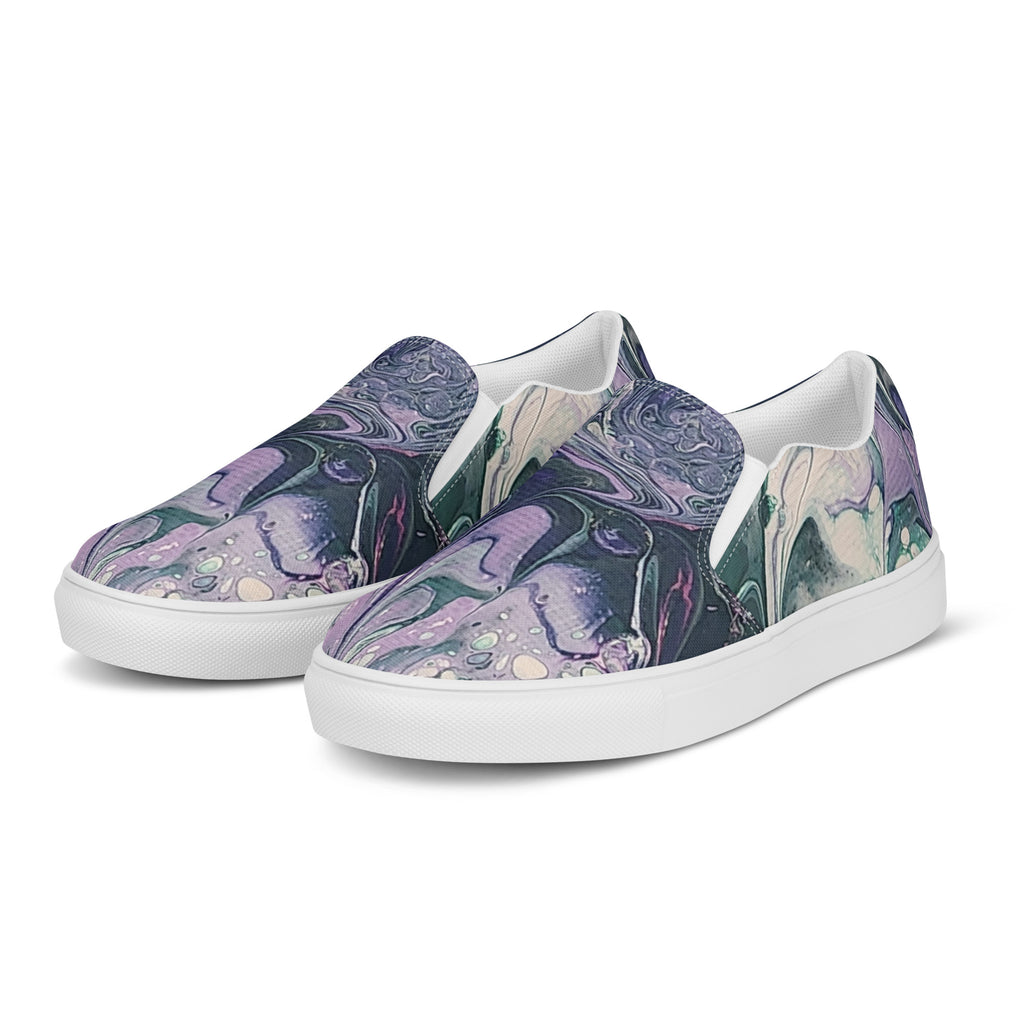 Pair of slip-on sneakers with a floral pattern on a white background