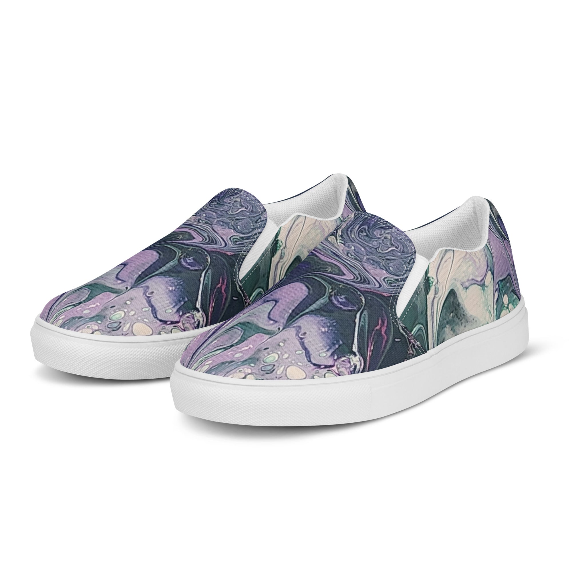 Pair of slip-on sneakers with a floral pattern on a white background