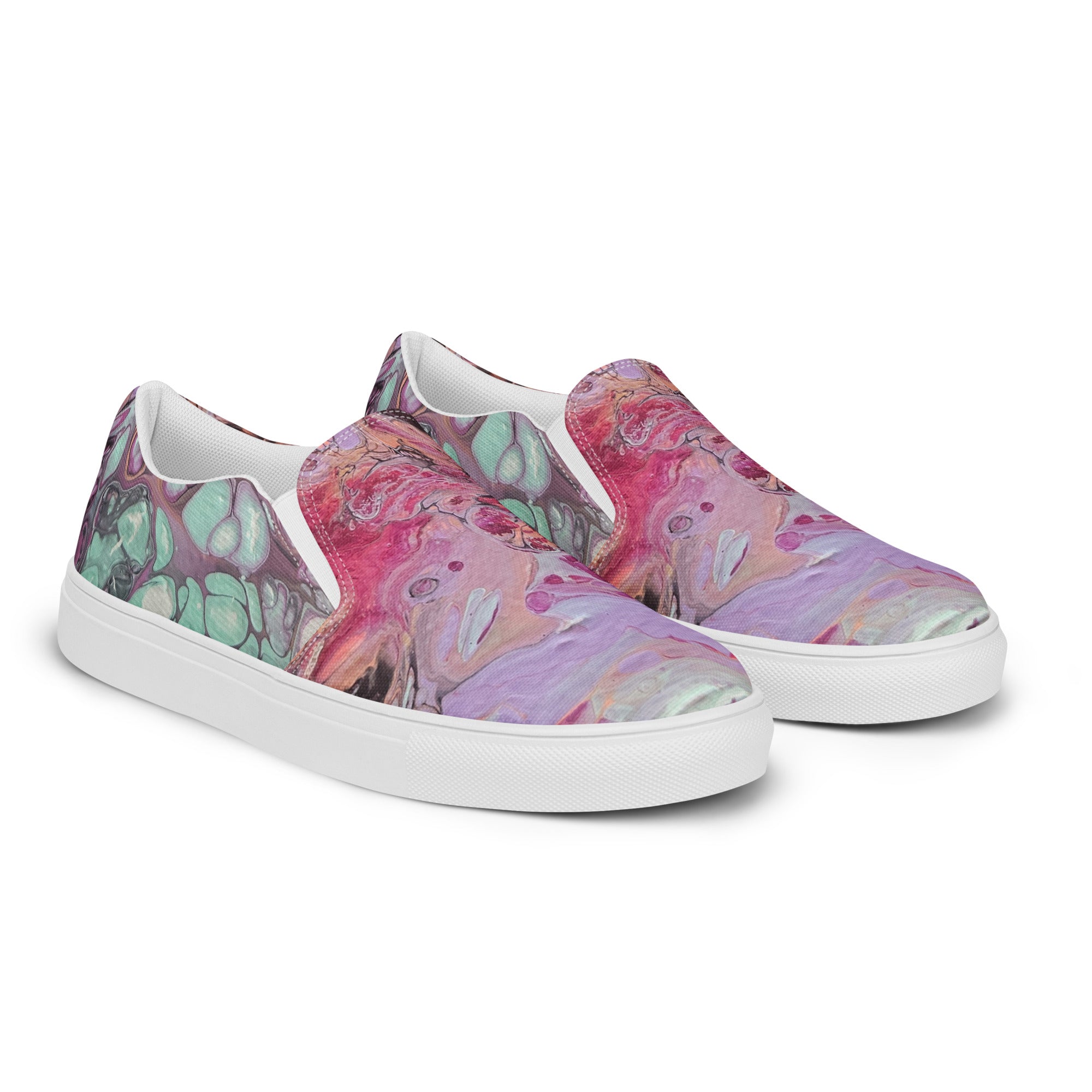 Colorful slip-on sneakers with a floral pattern on a white background